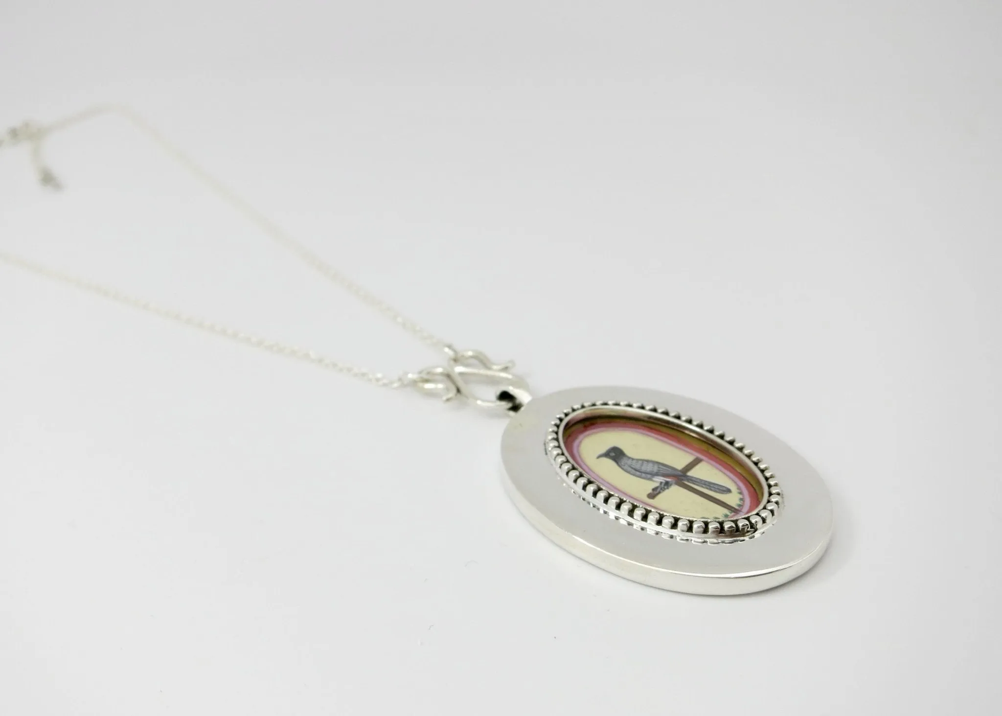 Timeless, elegant, and artistic Koel (bird) necklace