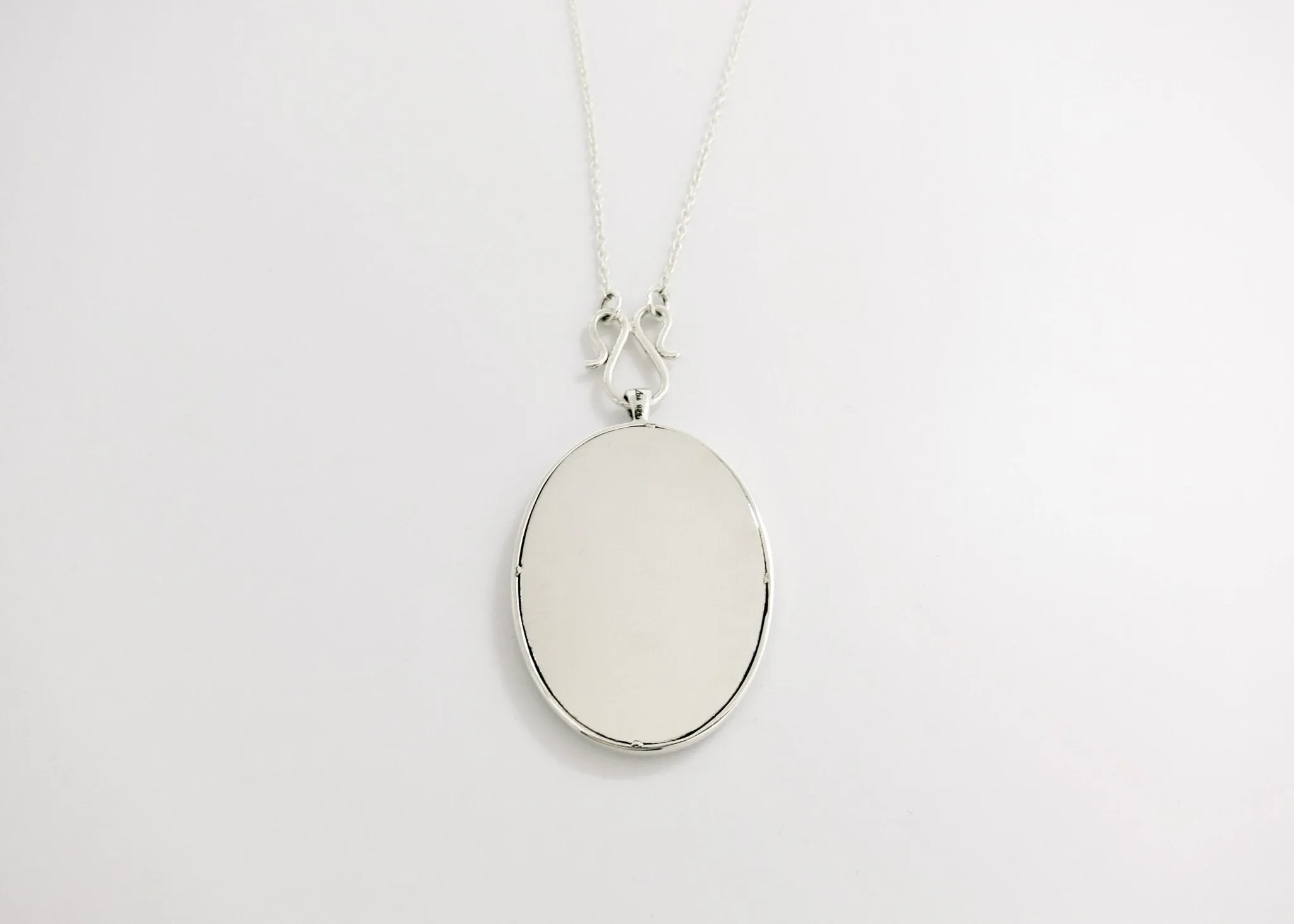 Timeless, elegant, and artistic Koel (bird) necklace