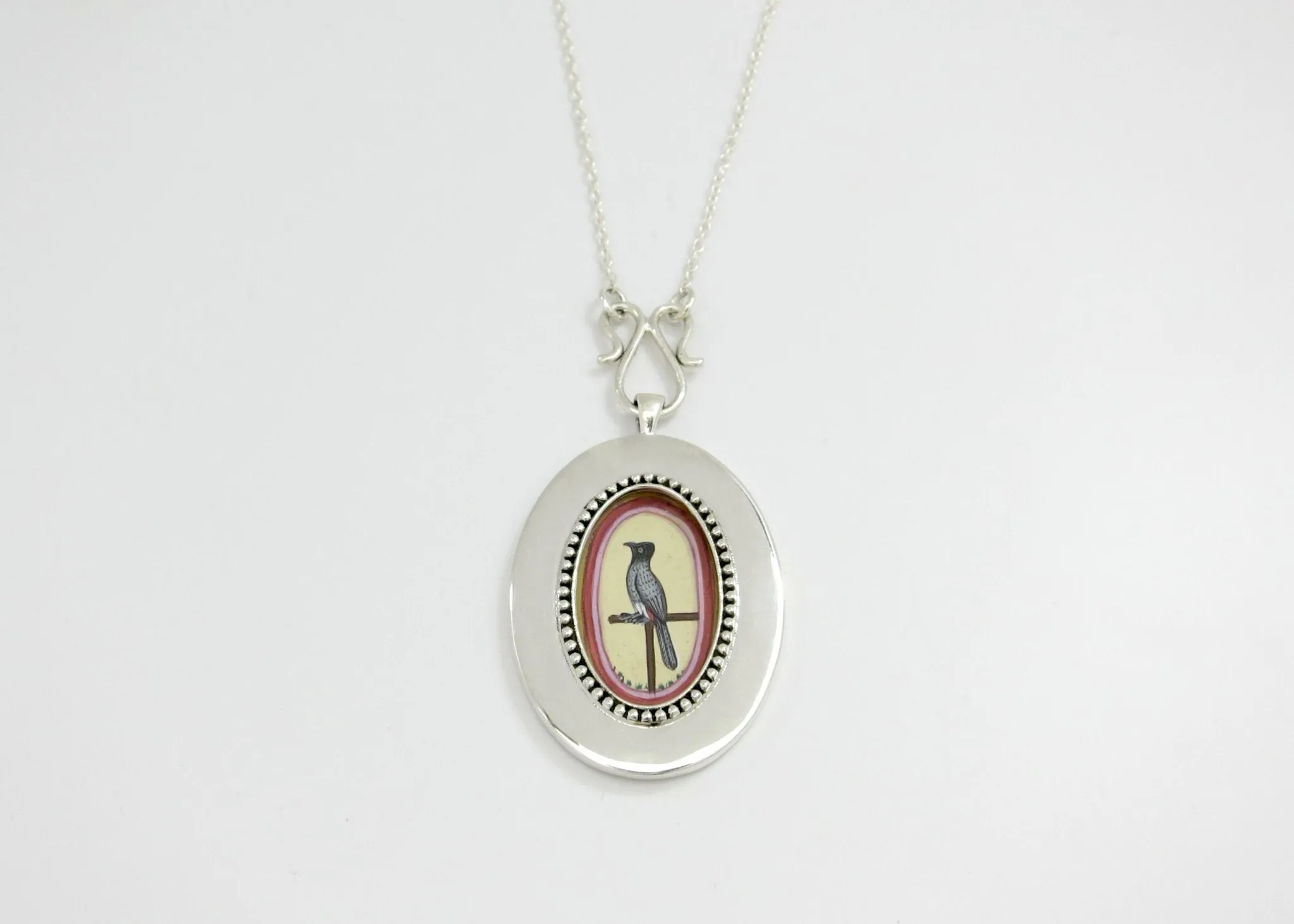 Timeless, elegant, and artistic Koel (bird) necklace