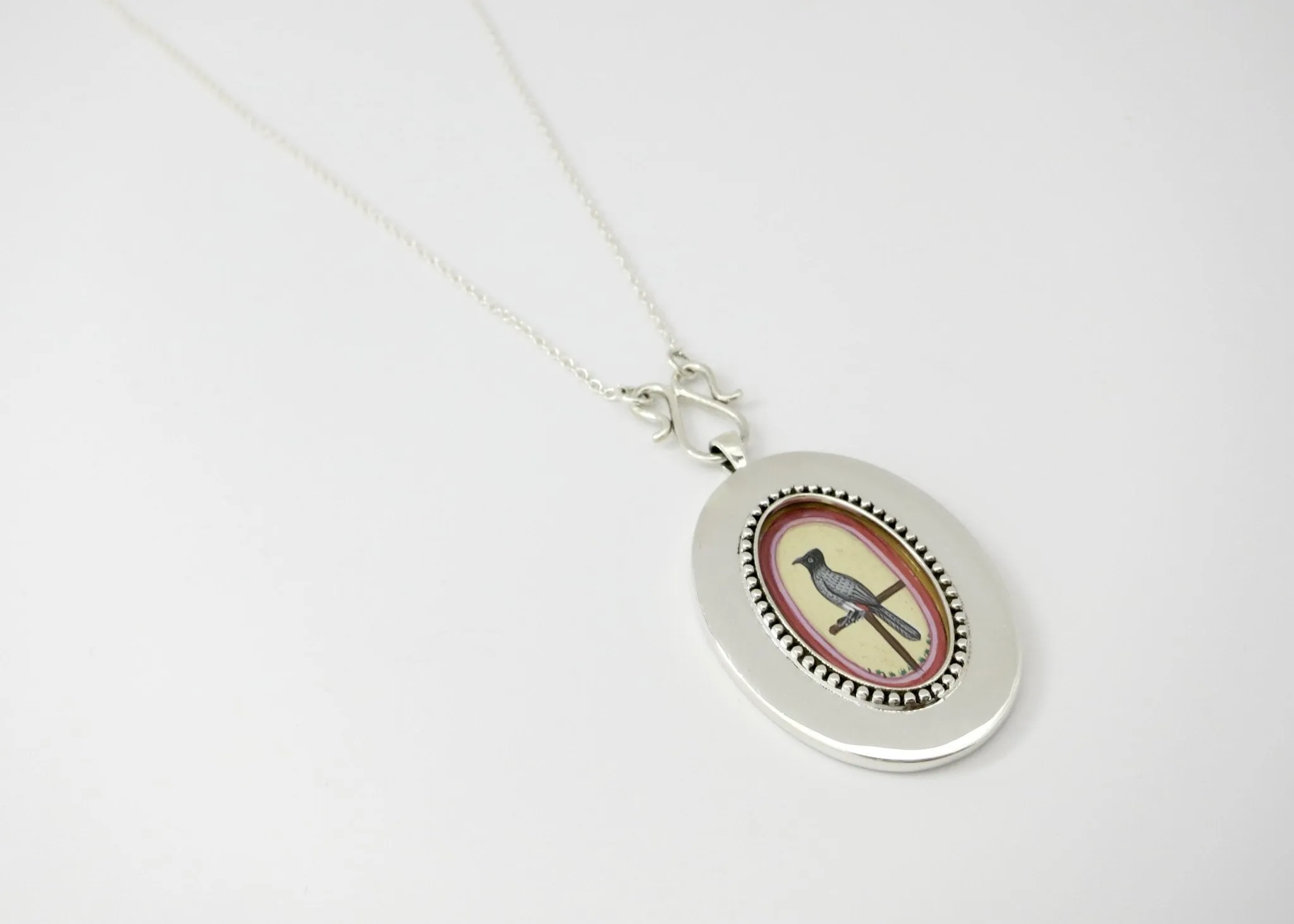 Timeless, elegant, and artistic Koel (bird) necklace